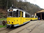 bad-schandau-kirnitschtalbahn/492683/triebwagen-t-57-nr1-von-veb Triebwagen T 57 Nr.1 von VEB Gotha, Baujahr 1957 und dahinter bei der Reinigungswäsche Beiwagen B 2 D Nr.26 von CKD Tatra, Baujahr 1968,in Bad Schandau am 11.04.2016.