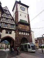 freiburg-breisgau-freiburger-verkehrs-ag/668030/urbos-100-gt-8-u-nr312 Urbos 100 GT 8 U Nr.312 von CAF Baujahr 2015 fährt durch das Schwabentor in Freiburg am 07.07.2019.