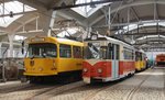 Schleifwagen T 4 D Nr.201 002 von CKD Tatra, Baujahr 1975 und Gleiskontrollwagen T 57 Nr.201 113-4 von VEB Gotha, Baujahr 1959, im Betriebshof Waltherstraße in Dresden am 09.04.2016.