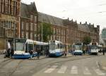 amsterdam-gemeente-vervoer-bedrijf/299735/gvba-tw-2135-805-2120-und GVBA TW 2135, 805, 2120 und 817 Stationsplein Amsterdam Centraal Station 18-09-2013.