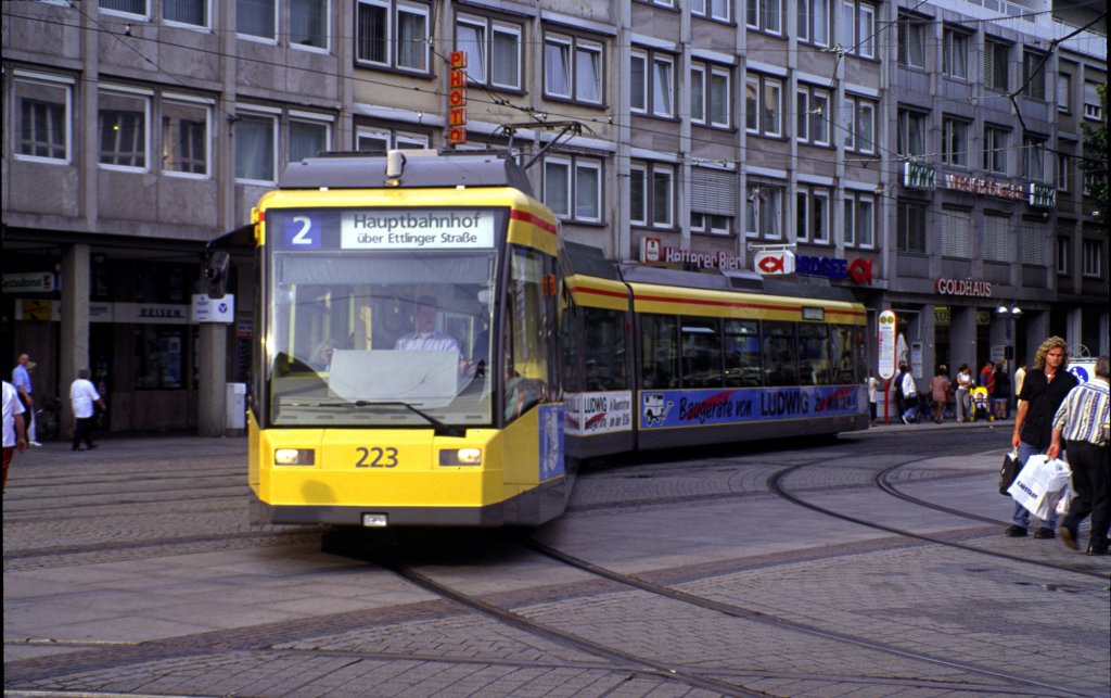 GT 6 - 70D/N Nr. 223von Düwag, Baujahr 1995, in Karlsruhe im Stadtverkehr, am 06.07.1999 - Diascan.